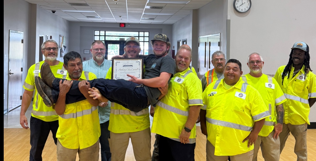 Town of Pageland staff celebrates with a participant in the SC Rural Water Association Pre-Apprenticeship Program